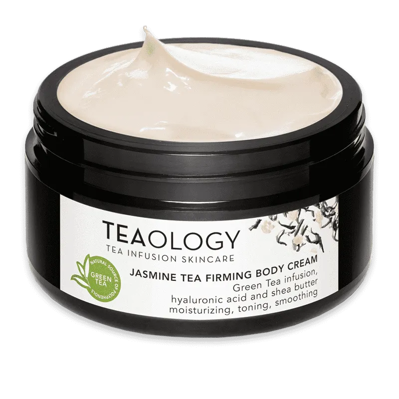 Schwarze Dose mit Jasmine Tea Firming Body Cream von Teaology, geöffnet, weiße Creme sichtbar.