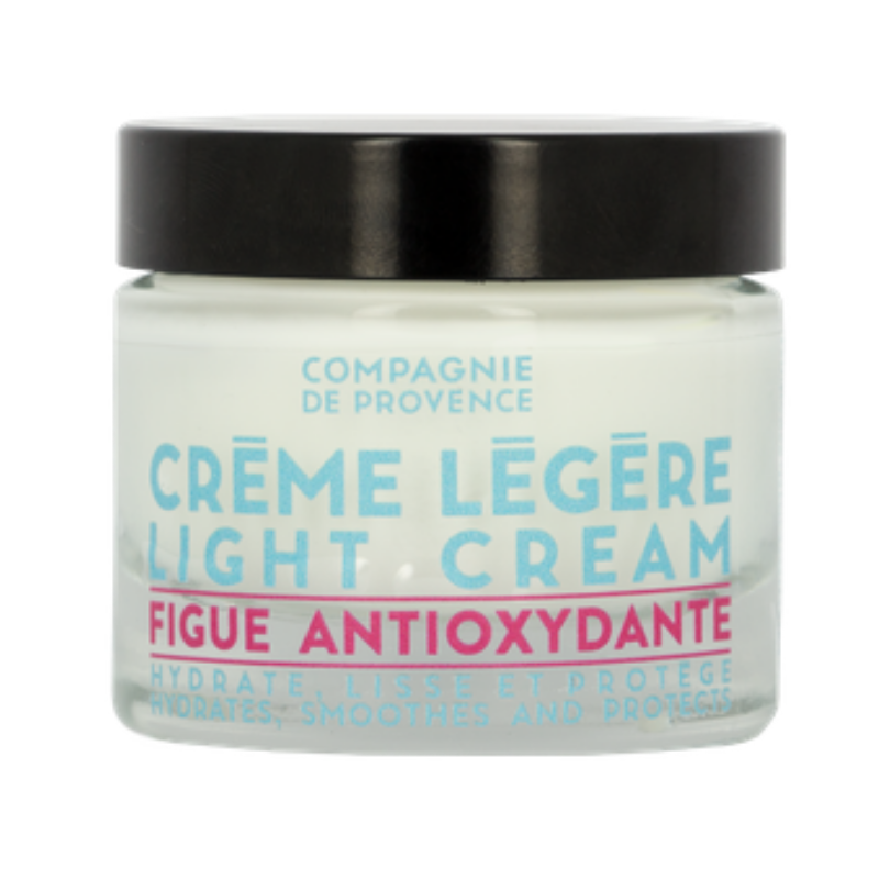 ANTI-AGING-LIGHT-FACE-CREAM Ein Glas mit 'Crème Légère Light Cream' von Compagnie de Provence, Figue Antioxidante, auf weißem Hintergrund.