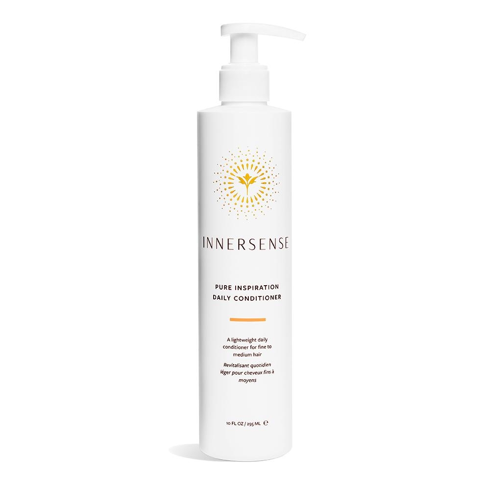 Innersense Pure Inspiration Daily Conditioner, 295 ml Flasche, weiß mit gelbem Logo und schwarzem Text.