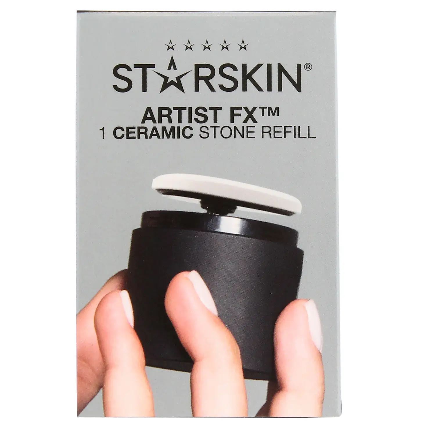STARSkin Artist FX 1 Keramikstein-Nachfüllung in schwarzer Verpackung, gehalten von einer Hand mit hellrosa lackierten Nägeln.