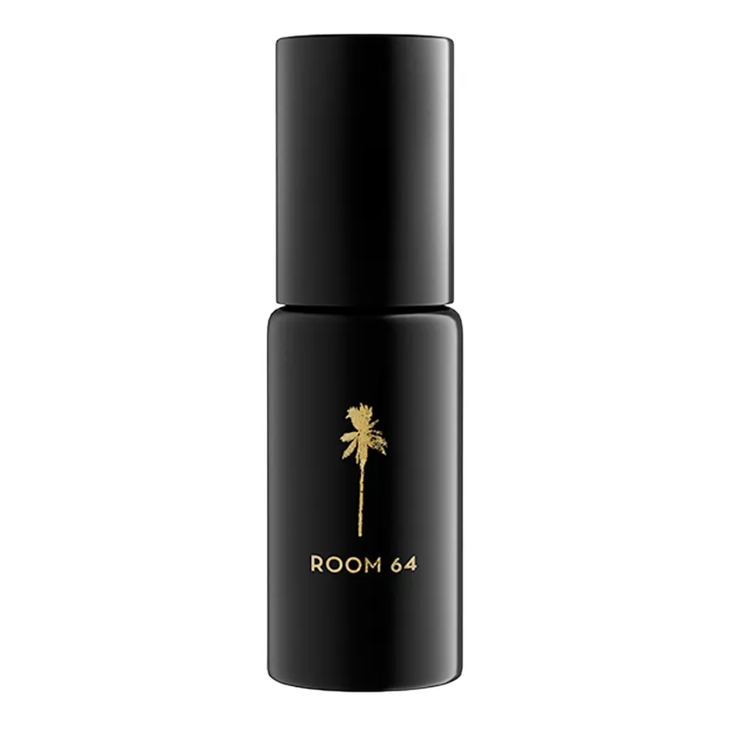 Schwarze Parfümflasche mit goldener Palme und der Aufschrift 'ROOM 64' von RAAW ALCHEMY.
