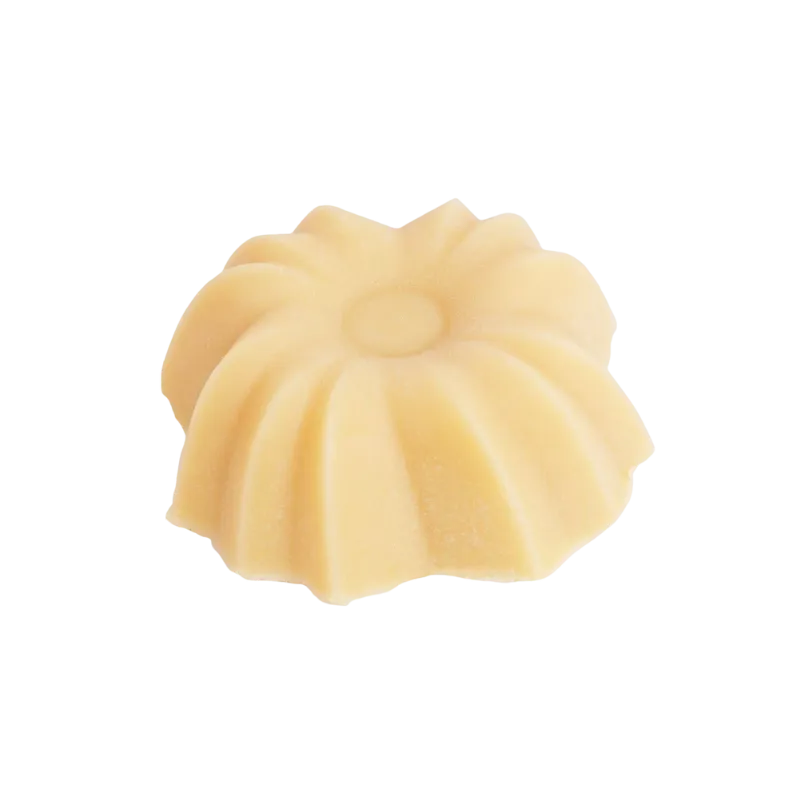 Gelber, fester Conditioner in Blumenform mit Vanilleduft von Lamazuna.