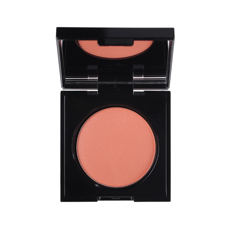 KORRES-WILD-ROSE-ROUGE-PEACH-18 KORRES Wild Rose Rouge in Pfirsichfarbe in einer schwarzen, offenen Puderdose.