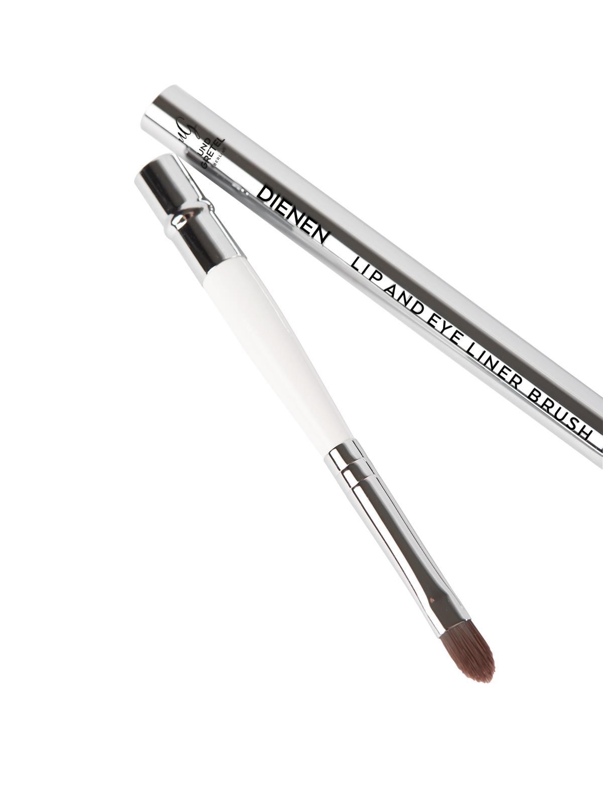 Zwei silberne Make-up-Pinsel, einer mit weißem Griff und brauner Spitze, der andere mit der Aufschrift 'Lip and Eye Liner Brush'.