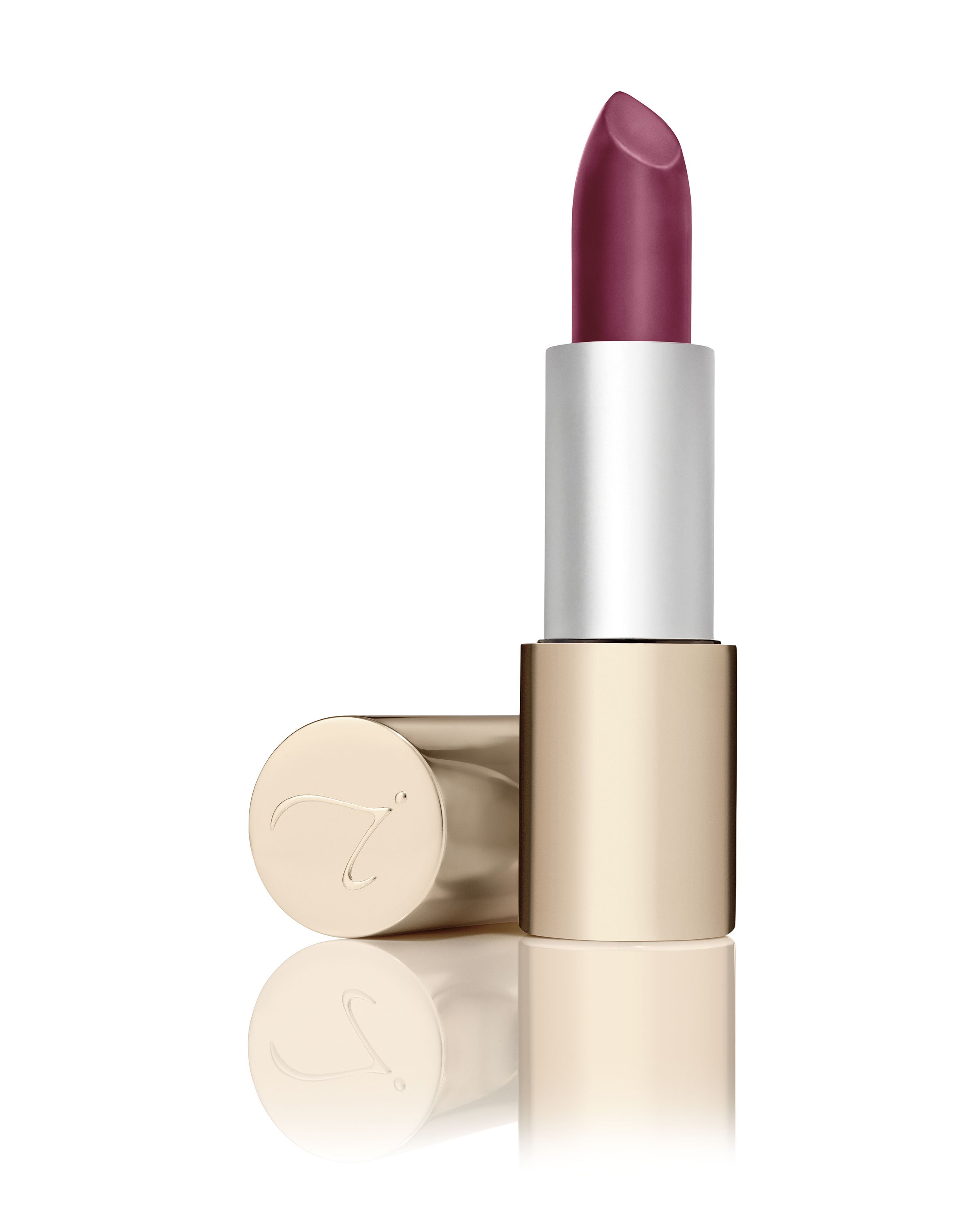 Ein geöffneter Lippenstift mit goldener Hülle und violetter Farbe, daneben liegt die abgenommene Kappe.