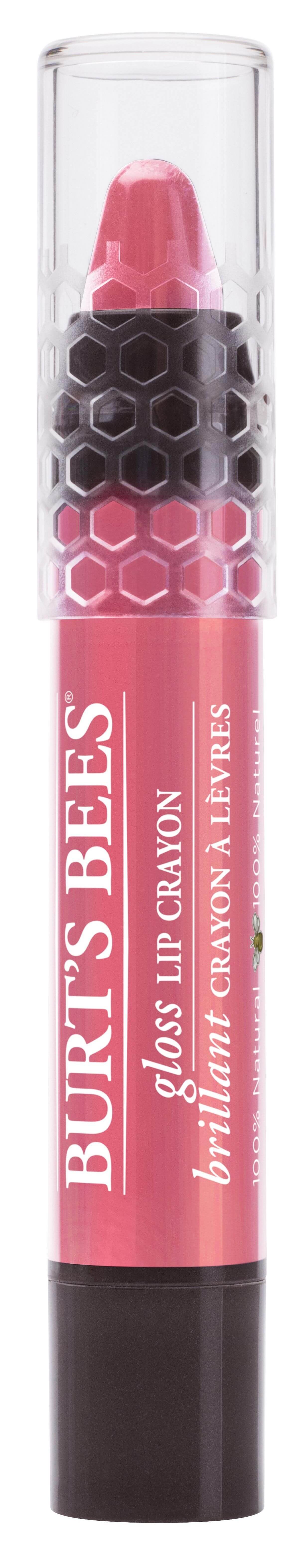 Burt's Bees Lippenstift in rosa, in einer transparenten Verpackung mit schwarzem Wabendesign.