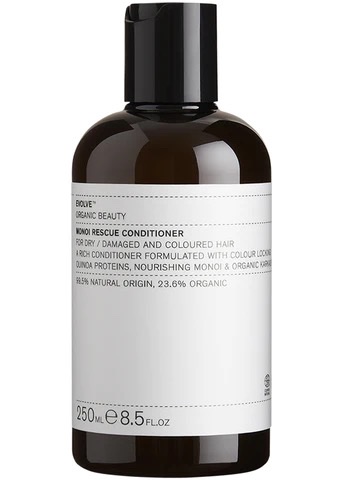 58DD5B6F-960B-44FD-9819-952DDACA9BB6_4_5005_c Braune Flasche mit Etikett 'Evolve Organic Beauty Monoi Rescue Conditioner' für trockenes und geschädigtes Haar, 250 ml.