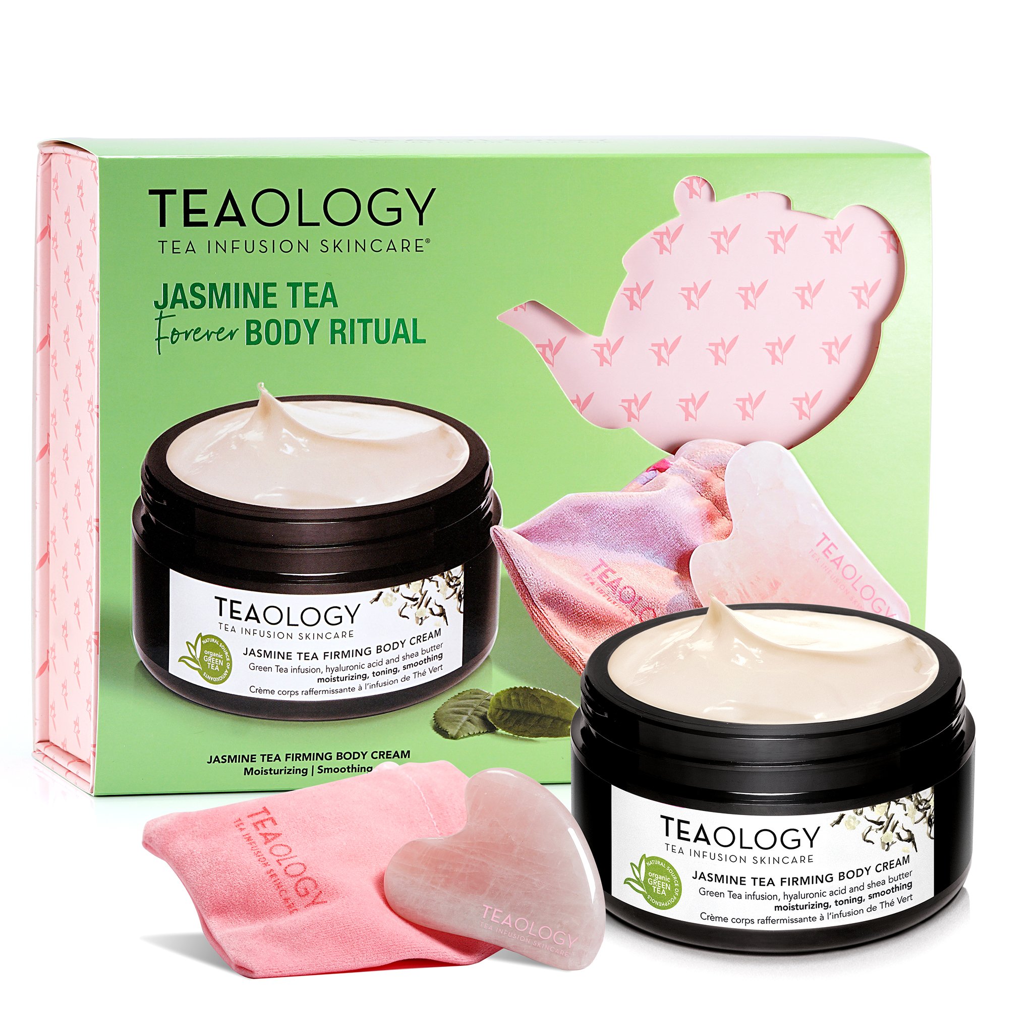 TEAOLOGY Jasmine Tea Firming Body Cream Set mit Herz-Massagestein und rosa Beutel vor Verpackung.