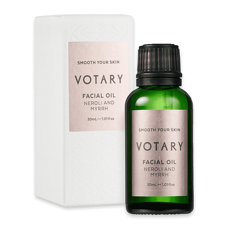 Grüne Flasche und weiße Box von Votary Facial Oil Neroli and Myrrh, 30ml.