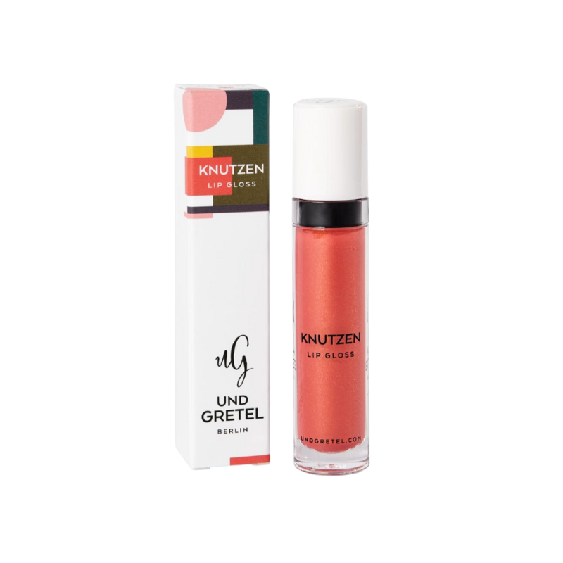 UND GRETEL KNUTZEN Lip Gloss 05 Apricot Shimmer, Verpackung und Flasche, auf weißem Hintergrund.