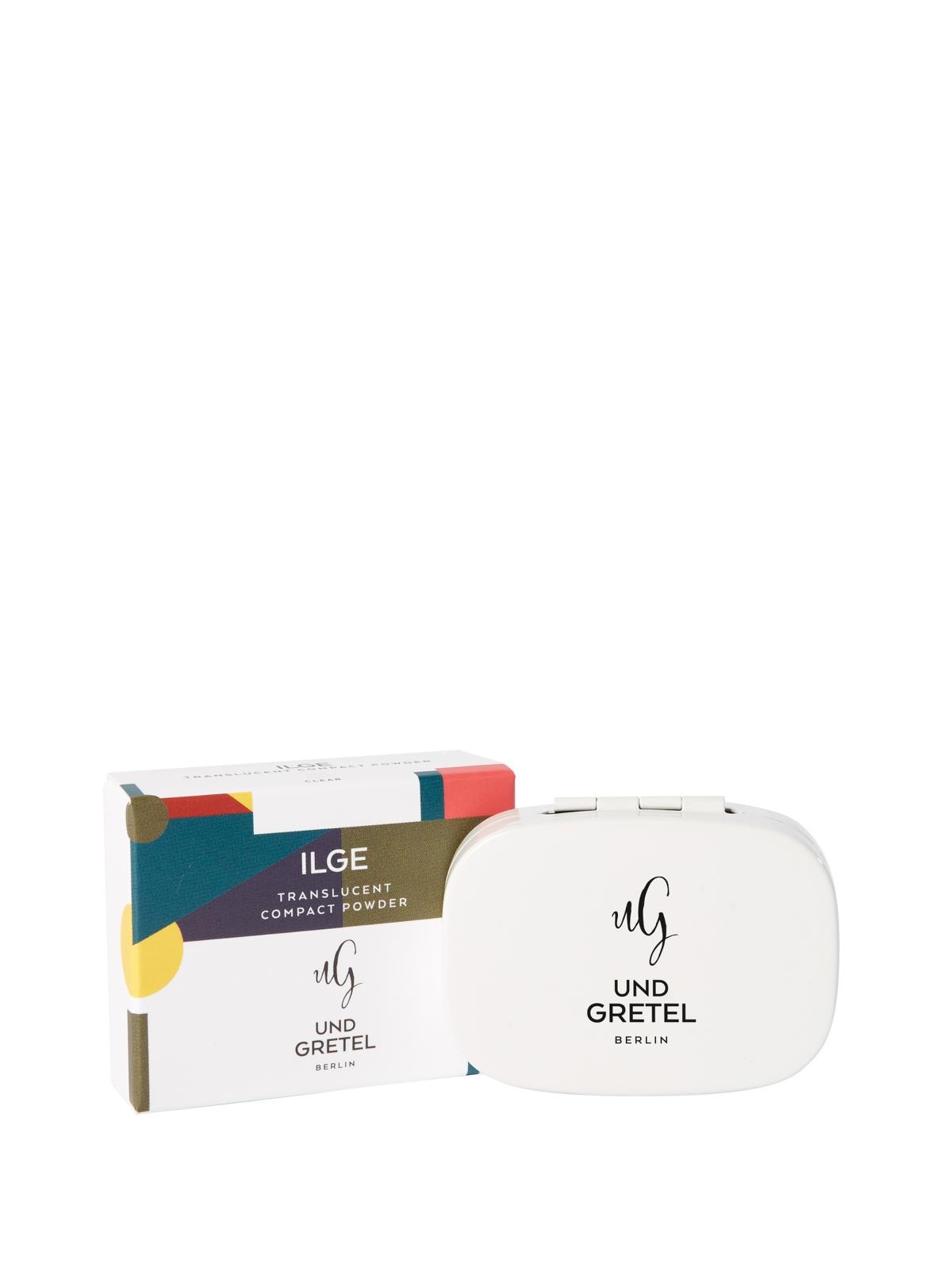 ILGE Translucent Compact Powder von Und Gretel Berlin, weiße Verpackung mit bunter Schachtel im Hintergrund.