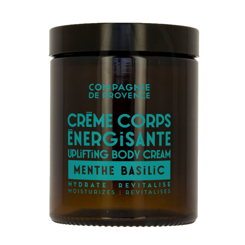 BODY-CREAM-180ML-MINT-BASIL Braunes Glasgefäß mit der Aufschrift 'Crème Corps Énergisante Uplifting Body Cream Menthe Basilic' von Compagnie de Provence.