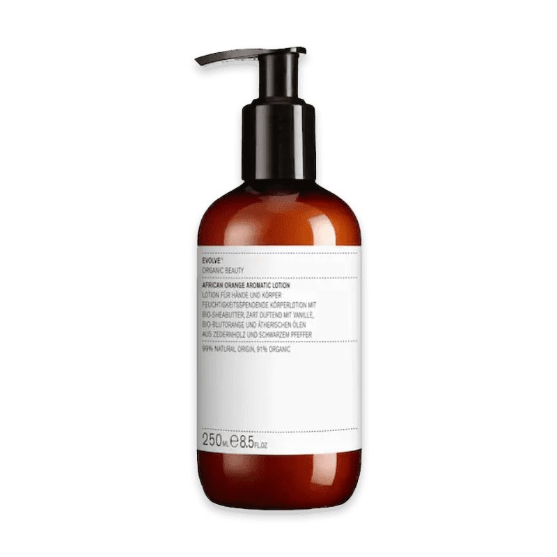 Evolve Organic Beauty African Orange Body Lotion, 250 ml, braune Flasche mit Pumpspender.