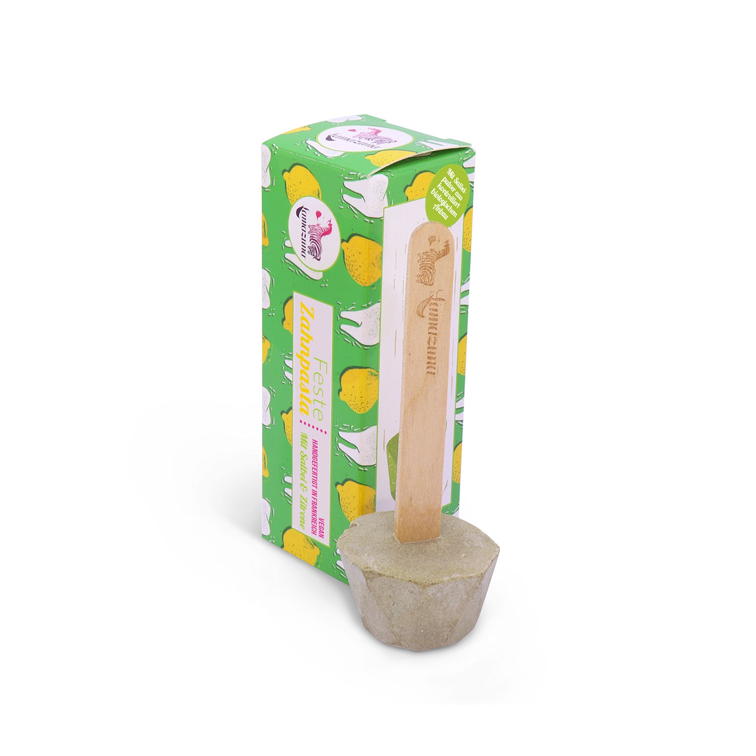 Zahnpasta am Stiel in umweltfreundlicher Verpackung mit Zitronenmotiv.